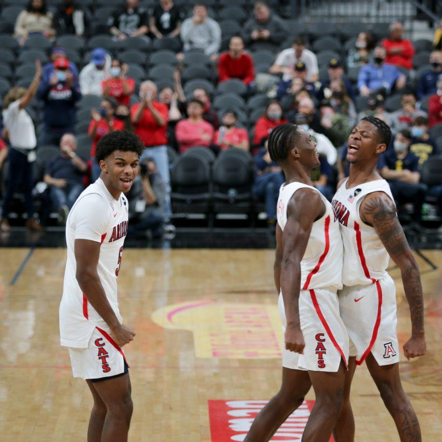  (#4) Dalen Terry , (#0) Bennedict Mathurin and (#5) Justin Kier celebrate after Terry had a great dunk that brought the fans to their feet in Las Vegas.  
