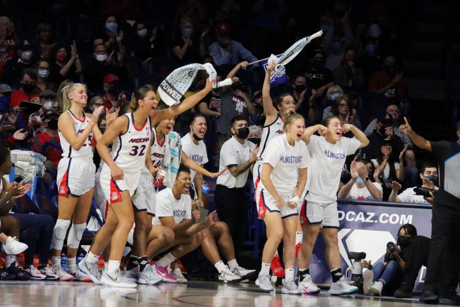 The University of Arizona womens basketball team celebrates after a three point shot scored on Friday Nov.19 at the Mckale Center. The Wildcats go on to win 78-36.