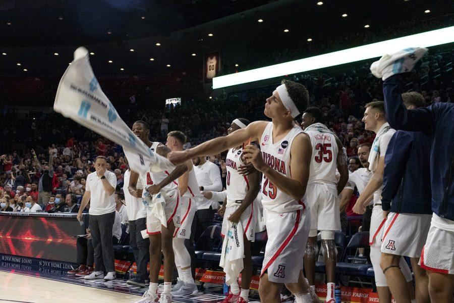 The Arizona mens basketball team celebrate the dunk by Oumar Ballo on Nov.12 in McKale Center. The Wildcats went on to win the game against the University of Texas Rio Grande Valley 104 to 50.