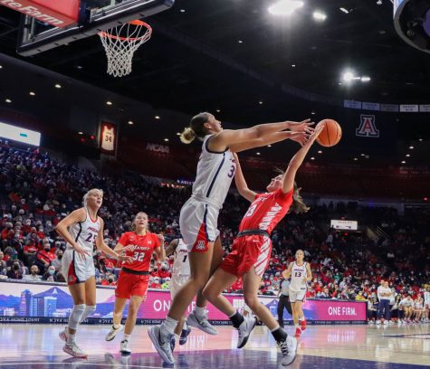 Lauren Ware a forward on the University of Arizona women's baksetball team blocks a shot from a Marits player on Friday Nov.19 at Mckale Center. The Wildcats go on to win 78-36.