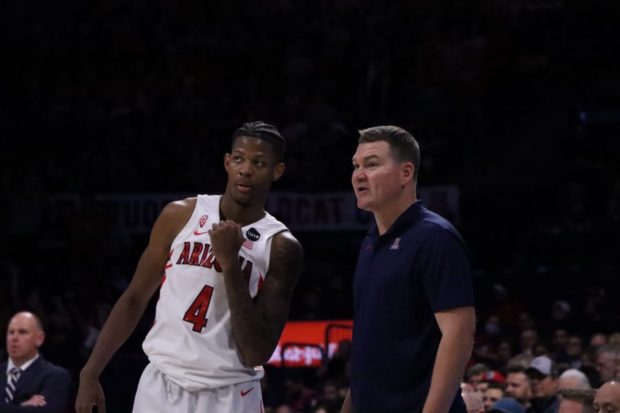 Arizona mens basketball player Dalen Terry (4) talks with head coach Tommy Lloyd during a timeout in McKale Center on Nov. 9. Lloyd was hired as the men’s head coach this year.