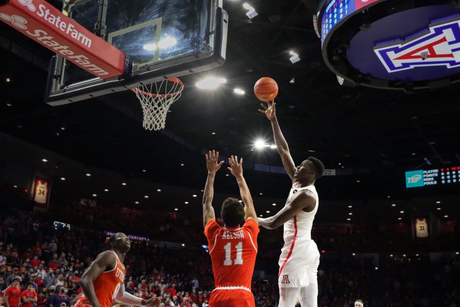 Christian Koloko, a sophomore on the Arizona mens basketball team, takes a hook shot over a Texas-Rio Grande Valley Vaqueros defender on Friday, Nov. 12, in McKale Center. The Wildcats lead at the half 49-24.