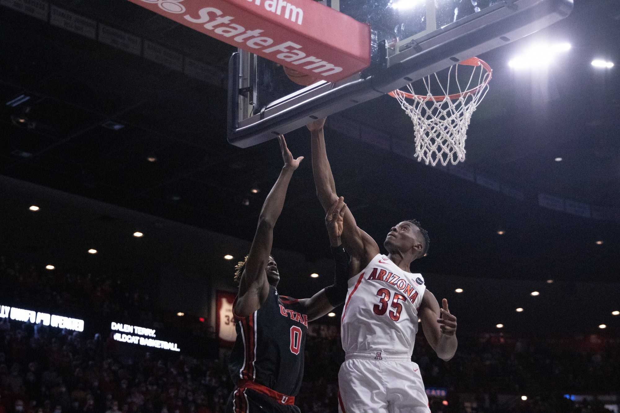 University of Arizona men's basketball player Christian Koloko (35) blocks the shot of a University of Utah player at McKale Center on Jan 15. Arizona beat Utah 82 - 64.