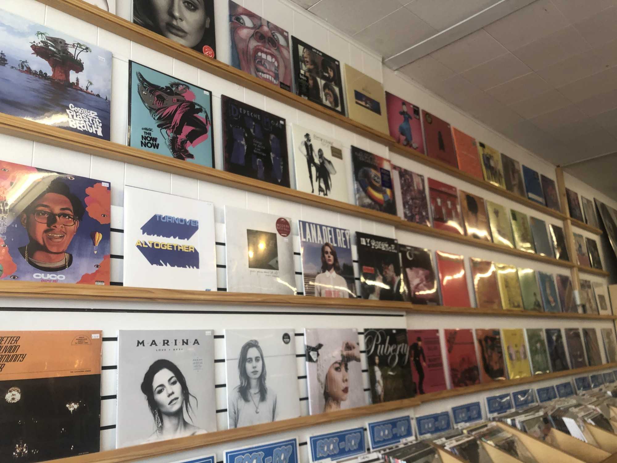 "The Rainbow Wall" at Heroes & Villians displays the latest/hottest vinyl.