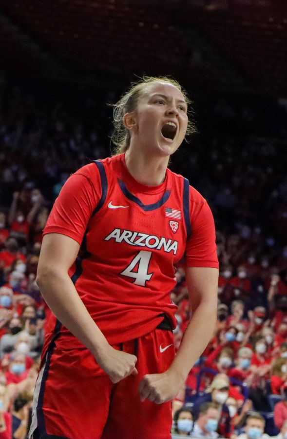 Madison Conner, a guard on the Arizona womens basketball team, draws a foul on Sunday, Feb. 13 in McKale Center. The Wildcats would go on to win the game 62-58.