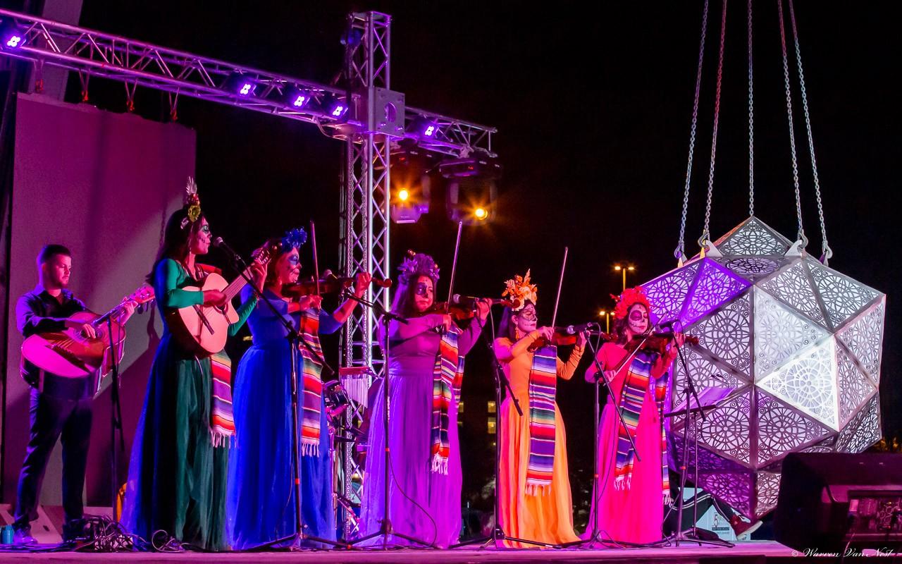 Las Azaleas performing on stage at the All Souls Procession in November of 2020 courtesy of Las Azaleas. 