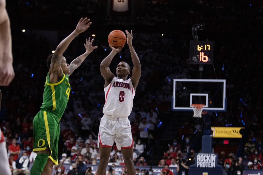 Arizona+player%2C+Bennedict+Mathurin+%280%29%2C+shoots+a+two+point+shot+while+a+University+of+Oregon+defender+closes+in+in+McKale+Center+on+Feb.+19.+Mathurin+finished+with+24+total+points+helping+the+Wildcats+win.