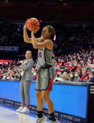 Sam Thomas, a guard on the Arizona woman's basketball team, takes a 3-point shot on Sunday, Feb. 6 in McKale Center. The Wildcats would go on to win 73-61.