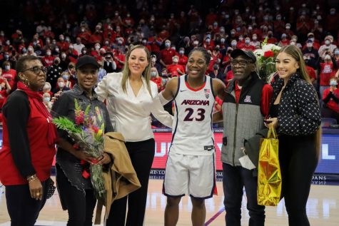 Bendu Yeaney takes senior pictures with head coach Adia Barnes after helping the Arizona women's basketball team win on Saturday, Feb. 26 in the McKale Center. Yeaney will be returning for next season as she has decided to do her graduate work at the UA.
