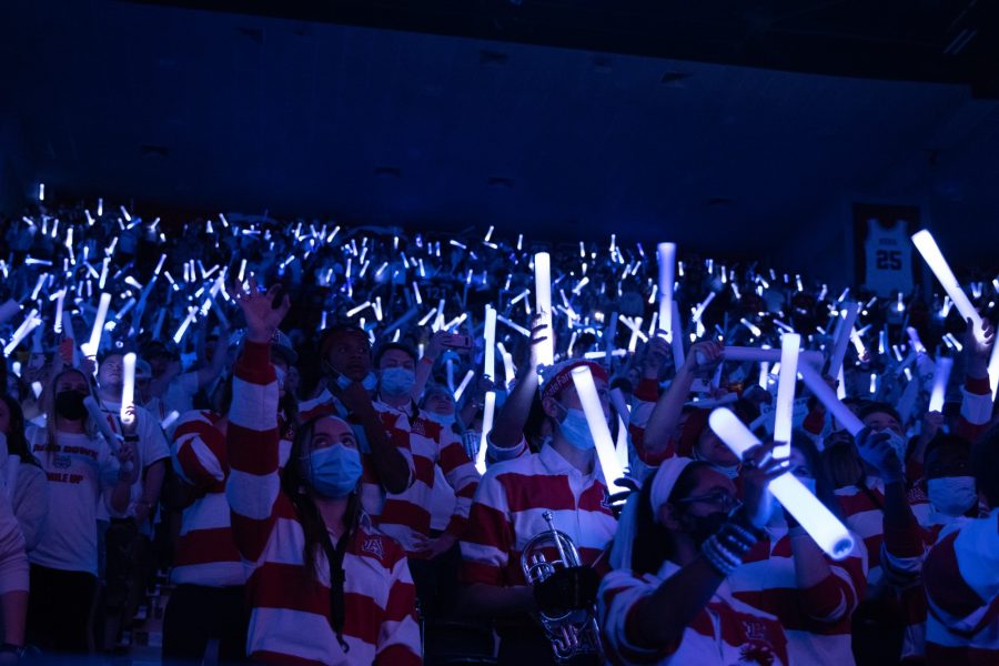 University of Arizona fans get to wave around light up foam sticks for introductions on Saturday Feb. 19 in the McKale Center. The fans would be a large factor in the win over University of Oregon as they were loud all game. 