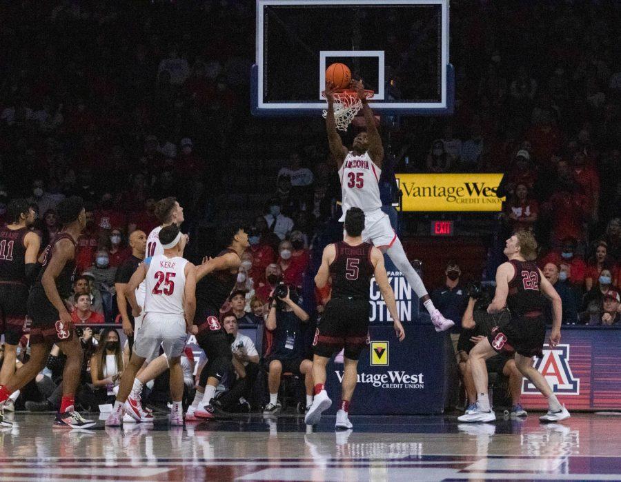 Christian Koloko scores two points against Stanford on March 3 in McKale Center. Koloko ended up scoring a total of 21 points. 