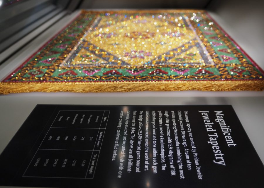 A one-of-a-kind jeweled tapestry is displayed in the University of Arizona Alfie Norville Gem & Mineral Museum. This piece, which originally adorned a royal palace in Asia, contains 15.9 kg of 18-karat gold and is set with 26,649 gemstones.