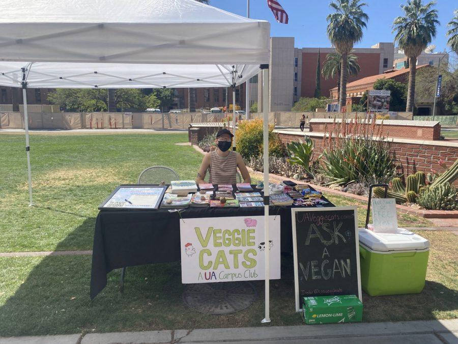 Veggie Cats vice president, Lenny B., at the Veggie Cats table on the UA Mall.