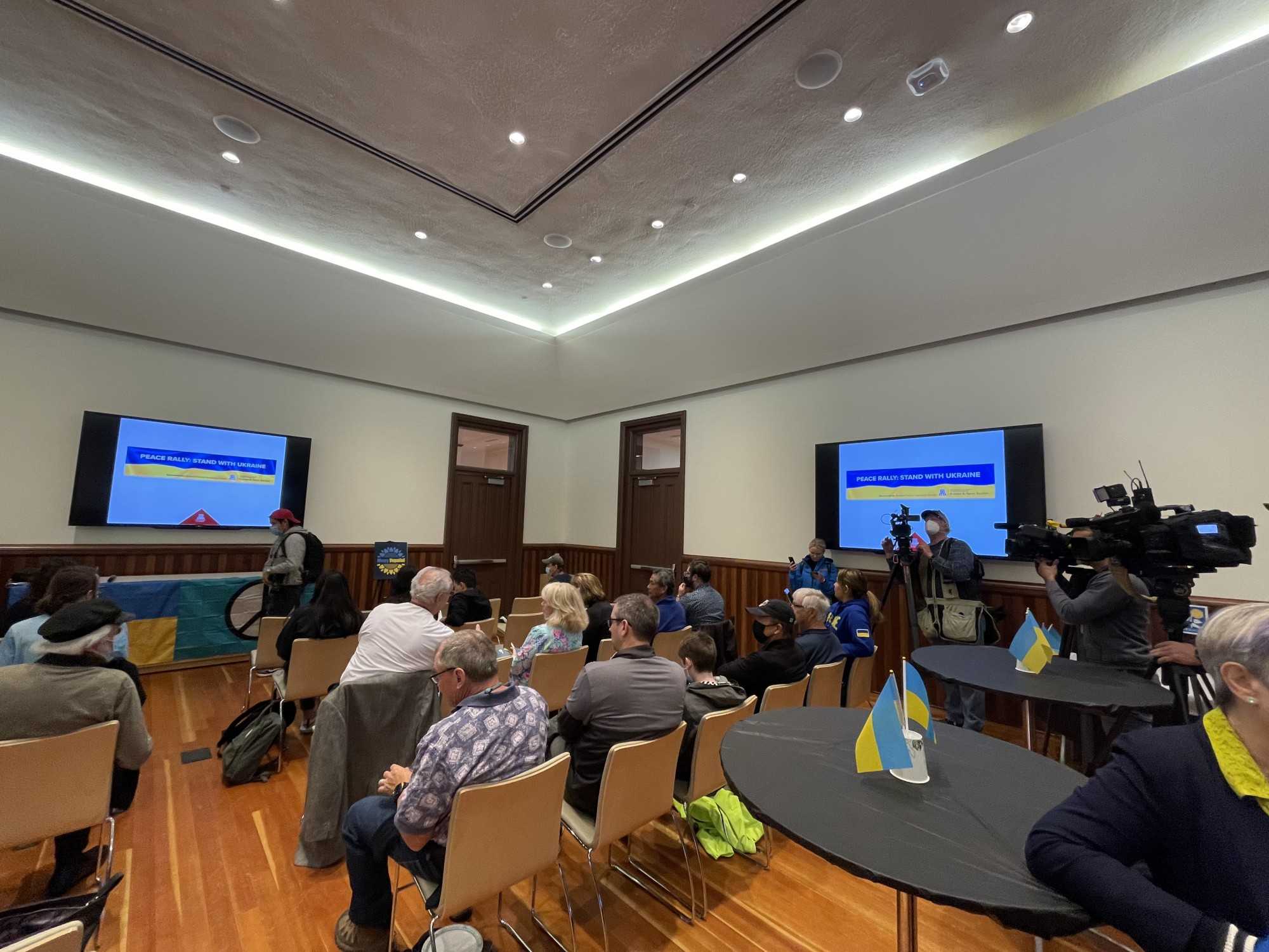 Attendees at the Silver and Sage Room in Old Main during a peace rally on Tuesday, March 29 to support Ukraine, and for those in the community affected by the invasion of the nation by Russian military forces.