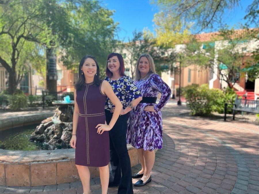 Elise Lopez, Allison Latham-Jones and Cynthia Chapman are three of the women on the Consortium on Gender-Based Violence team. They don purple attire in support of Domestic Violence Awareness Month. (Courtesy of Consortium on Gender-Based Violence)
