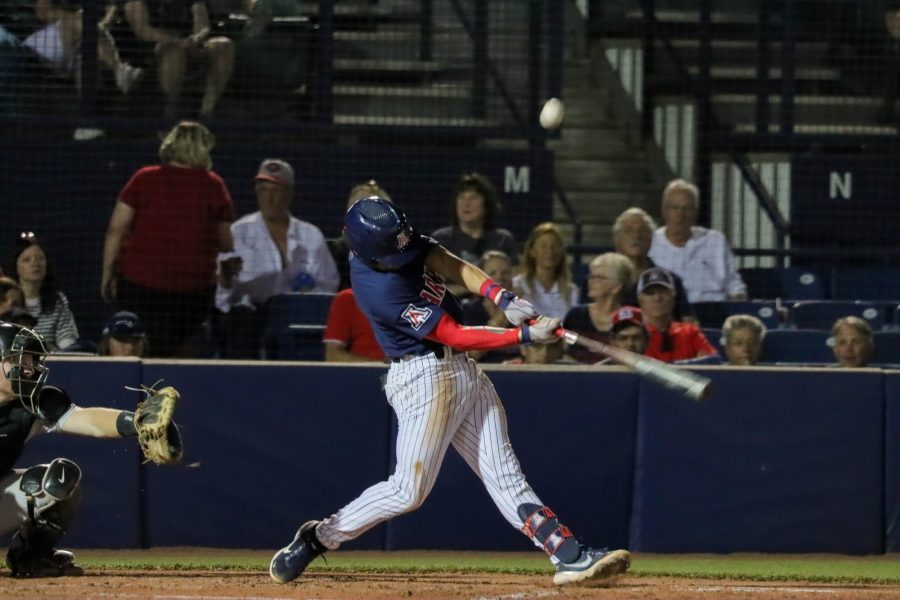 Tony Bullard, an infielder on the Arizona baseball team, hits a pop fly on Friday May 13 at Hi Corbett Field. The Wildcats would jump out to the early lead but would ultimately loose 9-12.