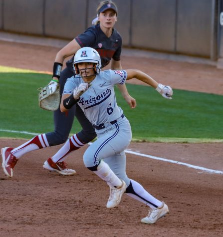 Janelle Meono an outfielder on the Arizona softball team, takes off to second after a teammate hits the ball on March 12 in Rita Hillenbrand Memorial Stadium. The Wildcats would go on to win 10-6.