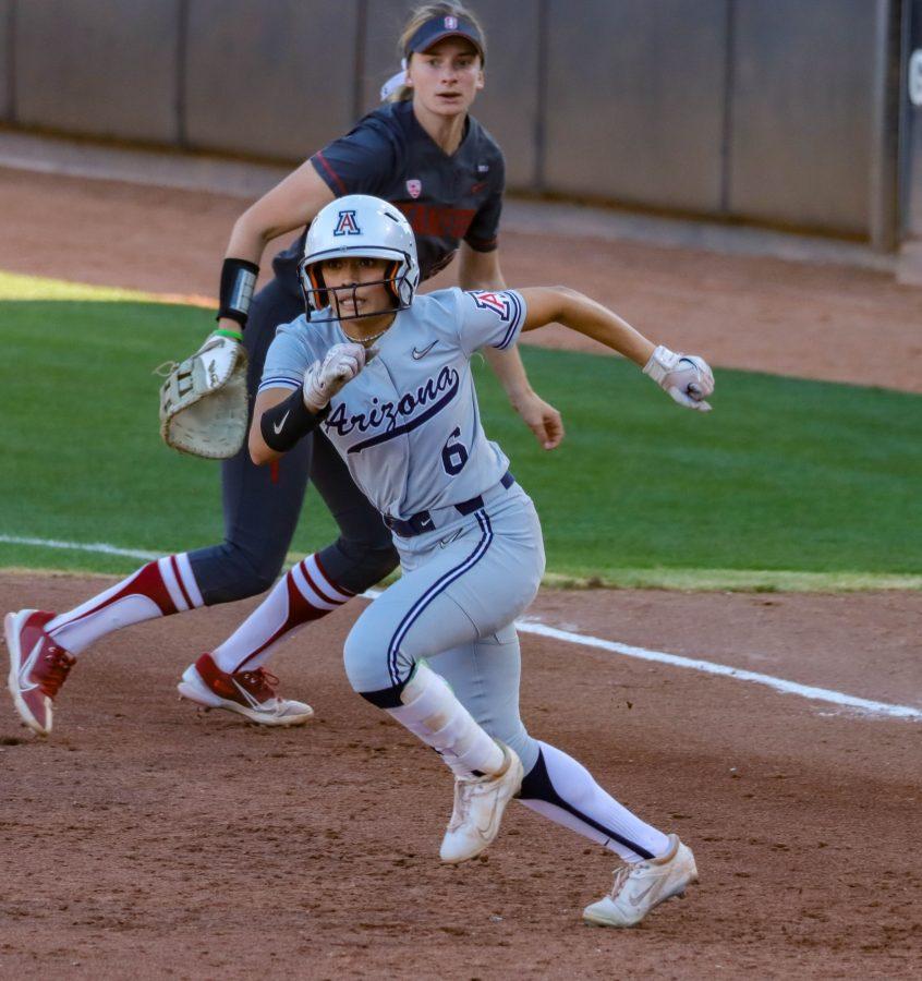 Janelle+Meono+an+outfielder+on+the+Arizona+softball+team%2C+takes+off+to+second+after+a+teammate+hits+the+ball+on+March+12+in+Rita+Hillenbrand+Memorial+Stadium.+The+Wildcats+would+go+on+to+win+10-6.