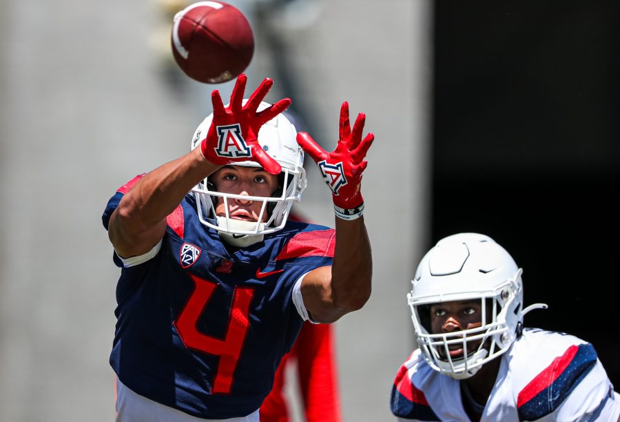 wide receiver Tetairoa McMillan (4), defensive back Christian Roland-Wallace (4) &#8212; TUCSON, ARIZ. -- Football Fall Camp, Day, 11.
Aug. 16, 2022. 
Photo by Mike Christy / Arizona Athletics