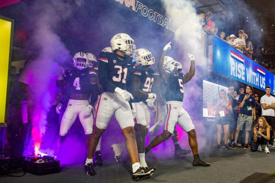 The+Arizona+football+team+stands+at+the+entrance+to+the+field+on+Sept.+17+at+Arizona+Stadium.+The+Wildcats+would+go+on+to+win+the+game+31-28+and+improve+their+record+to+2-1+on+the+season.%26nbsp%3B