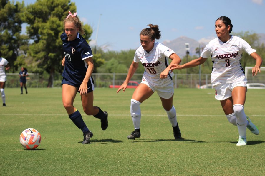 Ella Hatteberg and teammate Angela Baron steal the ball from Pepperdine at the Arizona womens soccer game on Sunday, Sept. 11 in Tucson, Arizona. The final score was Arizona 0 Pepperdine 2. 