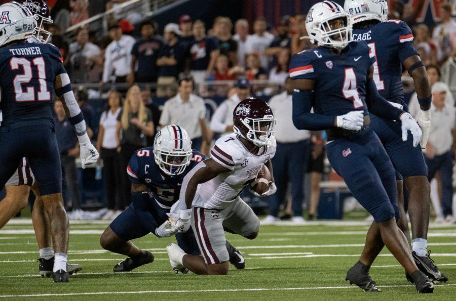 Arizona football player Christian Young tackles a Mississippi State running back on Sep 10, 2022, Arizona Stadium. The Wildcats would loose the game 17-39. 