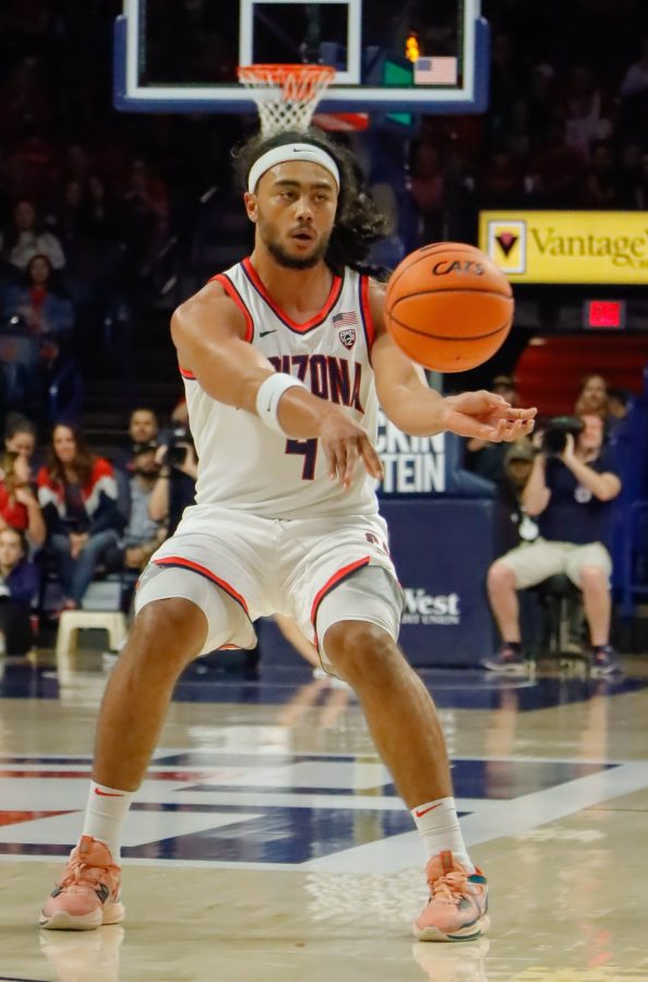 Kylan+Boswell%2C+a+guard+on+the+Arizona+mens+basketball+team%2C+passes+the+ball+to+a+teammate+in+the+season+opener+on+Nov.+7%2C+in+McKale+Center.+The+Wildcats+won+the+game+117-75.