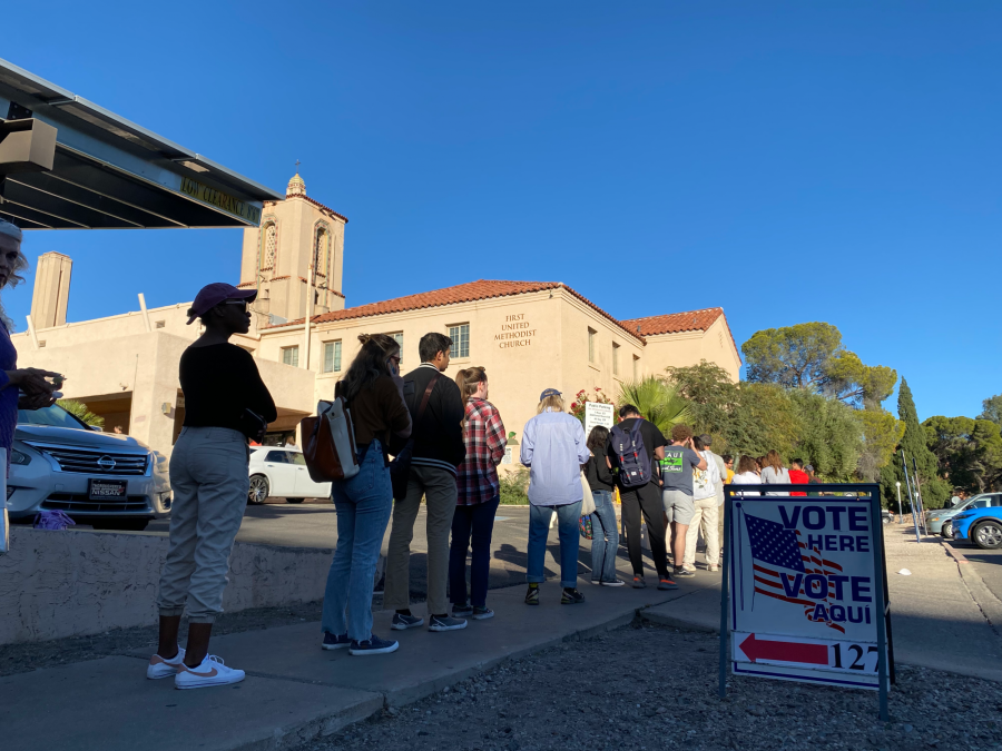 People wait in line to vote for the 2022 midterm election at the First Methodist Church polling station Nov. 8, in Tucson. Many University of Arizona college students chose to vote here due to the close proximity to campus.