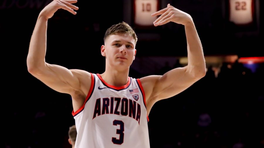 Pelle+Larsson%2C+a+guard+on+the+Arizona+mens+basketball+team%2C+encourages+the+crowd+to+get+loud+in+their+game+on+Nov.+17%2C+in+McKale+Center.+The+Wildcats+would+win+the+game+104-77.