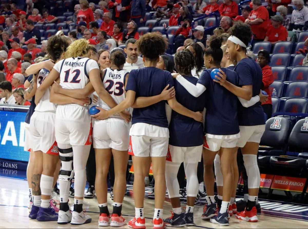 The Arizona women's basketball team huddles during an exhibition game against West Texas A&amp;M University on Oct. 27, in McKale Center. The Wildcats won 86-63.