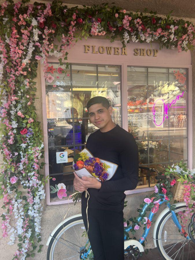Guillermo Bravo, owner of The Green Room, stands in front of the new flower shop he opened on Pennington Street in downtown Tucson. The business makes floral arrangements for a wide variety of events and occasions.