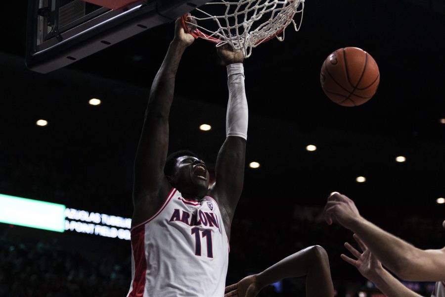 Arizona men’s basketball center Oumar Ballo dunks a ball on Jan. 19 in McKale Center. The Wildcats went on to win 81-66 against USC.