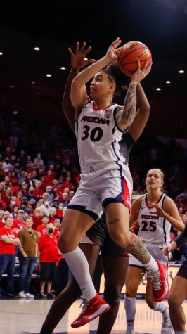 Jade Loville (30), a guard on the Arizona womens basketball team, takes a shot on Jan. 29 in McKale Center. The Wildcats would lose the divisional game against Washington State University 70-59.