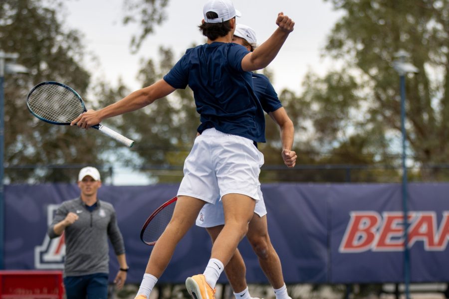  
Eric Padgham and Gustaf Strom chest bump in celebration at a doubles match Pepperdine University on Feb. 3 at the LaNelle Robson Tennis Center. The Wildcats went on to win the match 6-1. 