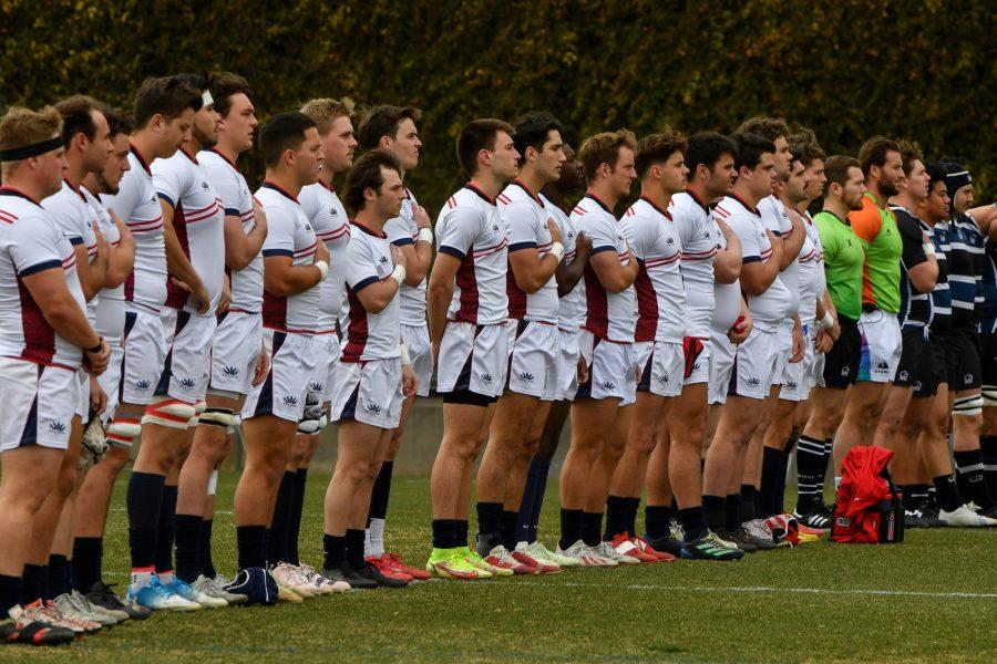 The Arizona rugby team lines up with their hands over their hearts for the national anthem. (Photo courtesy of Linda Brothers)