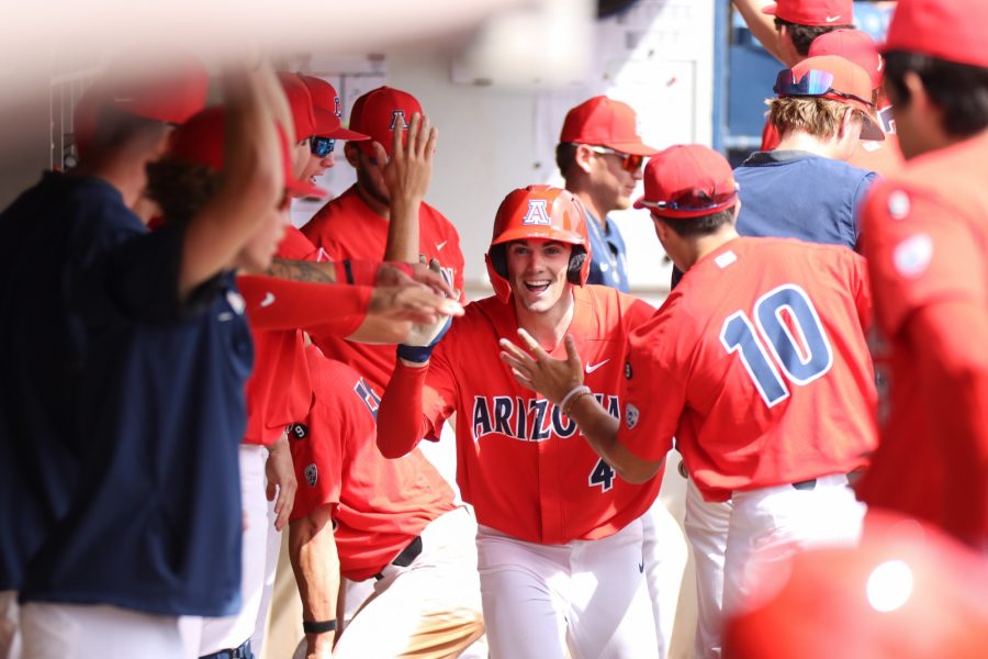 Arizona outfielder Brendan Summerhill celebrates in the dugout after a run in a game against California on March 12 at Hi Corbett Field. The Wildcats went on to win the game 10-5, ending the series with a full sweep. 