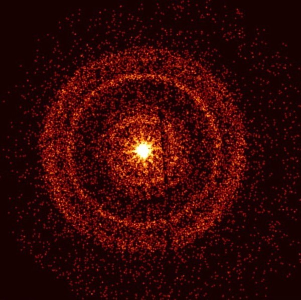 The brightest ever Gamma-Ray Burst illuminates the sky on October 9, 2022, captured an hour later in this image, showcasing the X-ray scattered rings formed by dust layers in our galaxy. (Image Credit: NASA, Swift, A. Beardmore - University of Leicester)