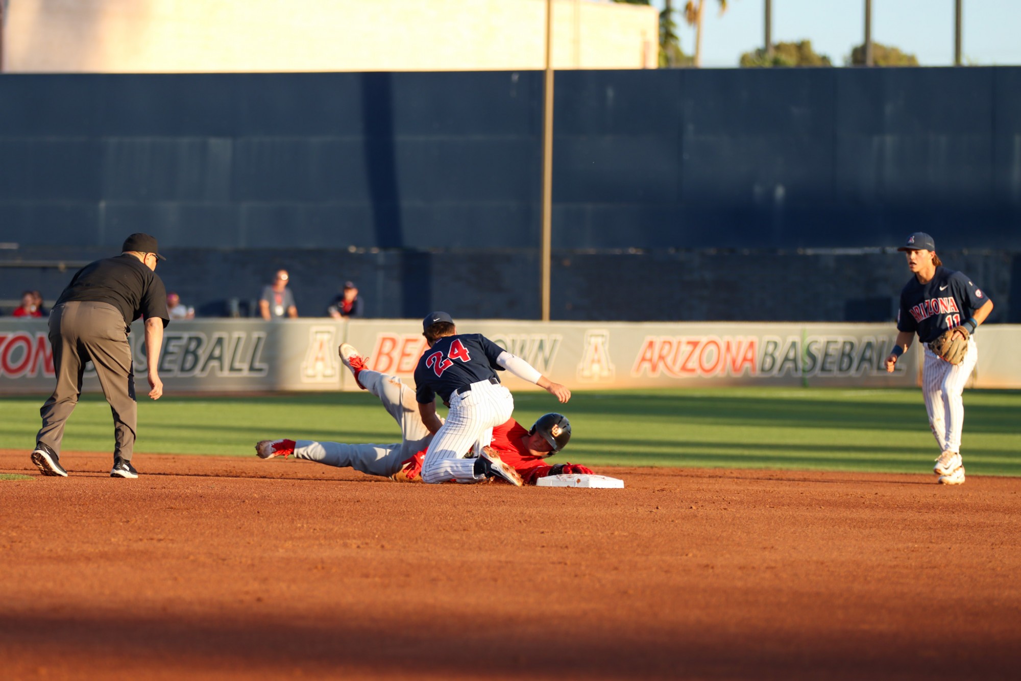 Arizona second baseman Mason White tags out an opponent in a game against Utah on April 22 at Hi Corbett Field. The Wildcats went on to win the game 19-2. 