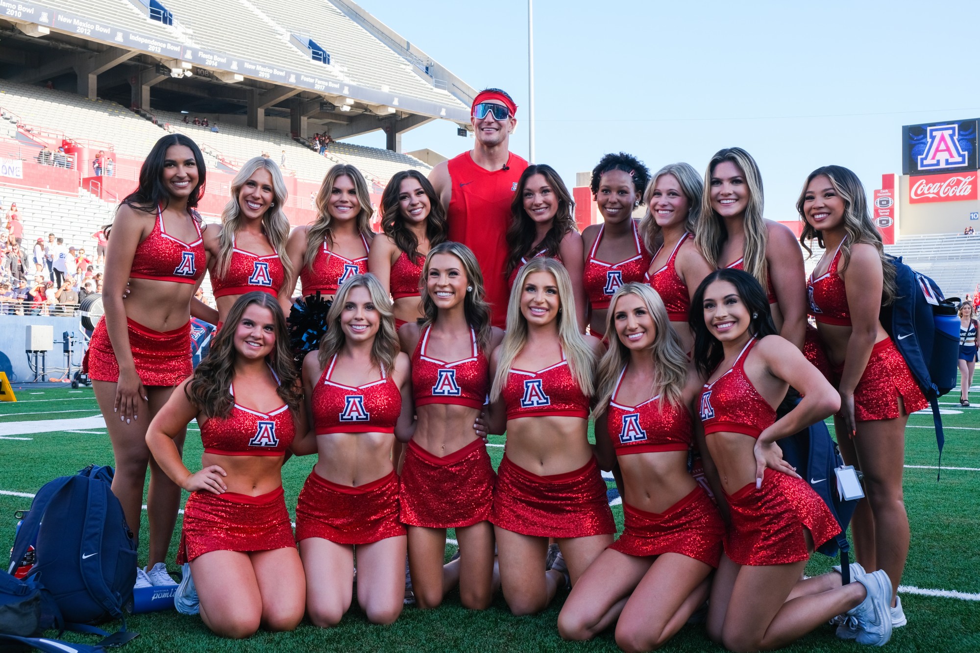 The Wildcat pom line poses with captain Gronk with Arizona Pomline on April 15 at Arizona Stadium. The two Gronk head coaches for this year's game were Chris and Rob Gronkowski.