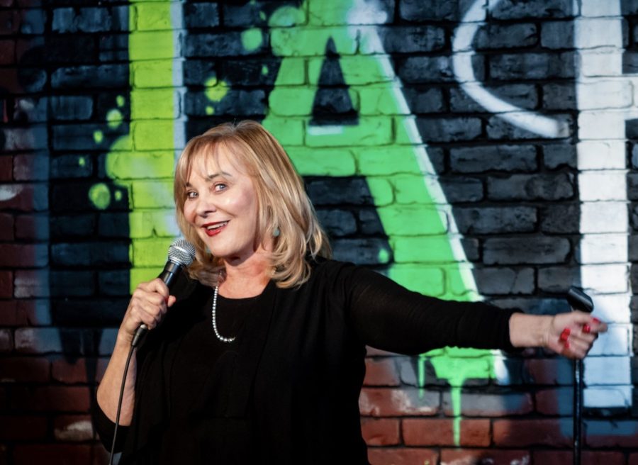Nancy Stanley performing at Laffs Comedy Café with her show, The Estrogen Hour, which promotes local women in comedy. (Photo courtesy of Nancy Stanley.)