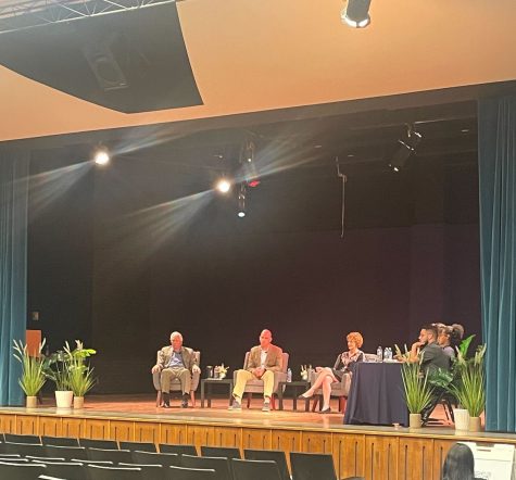 A group of panelists, including President Dr. Robert C. Robbins and CAPS leadership, speak at the Student Safety Forum hosted by ASUA on Friday, April 28. 
