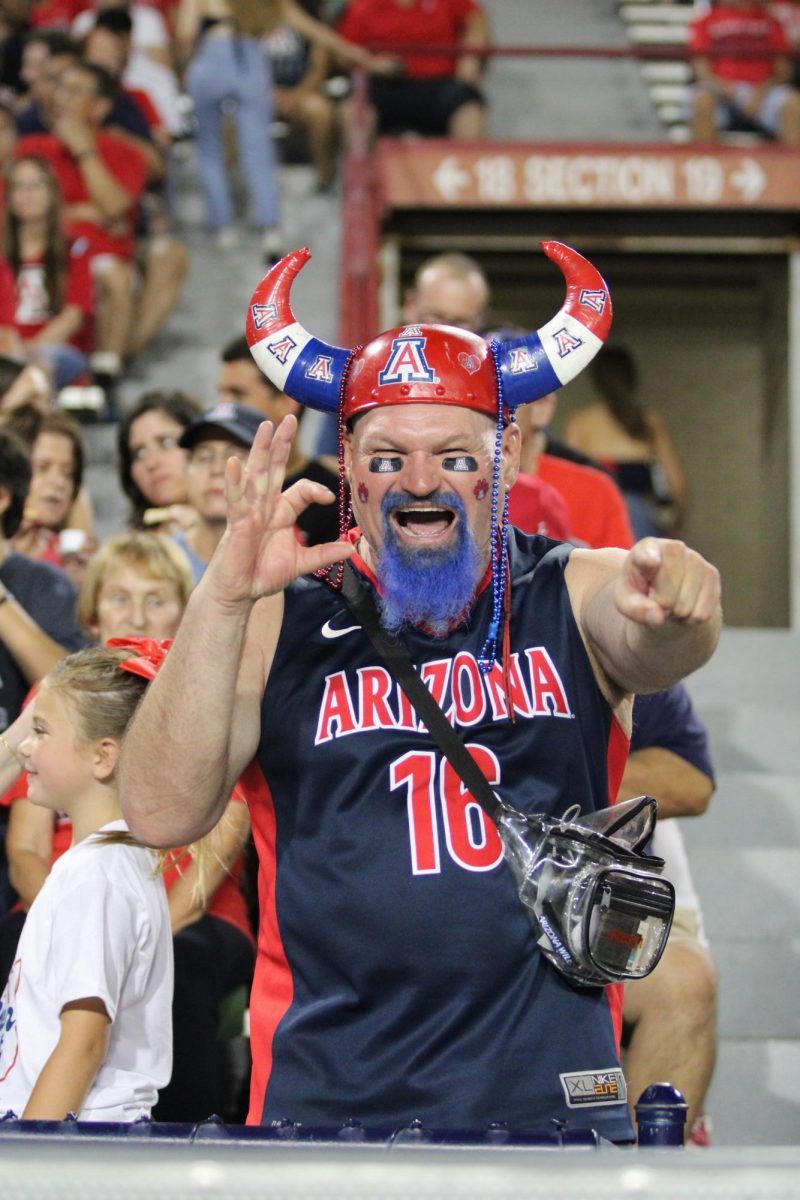 A Wildcats fan gets hyped for the first home football game of the season on Saturday, Sept. 2, 2023. UA secured a 38-3 win against NAU.