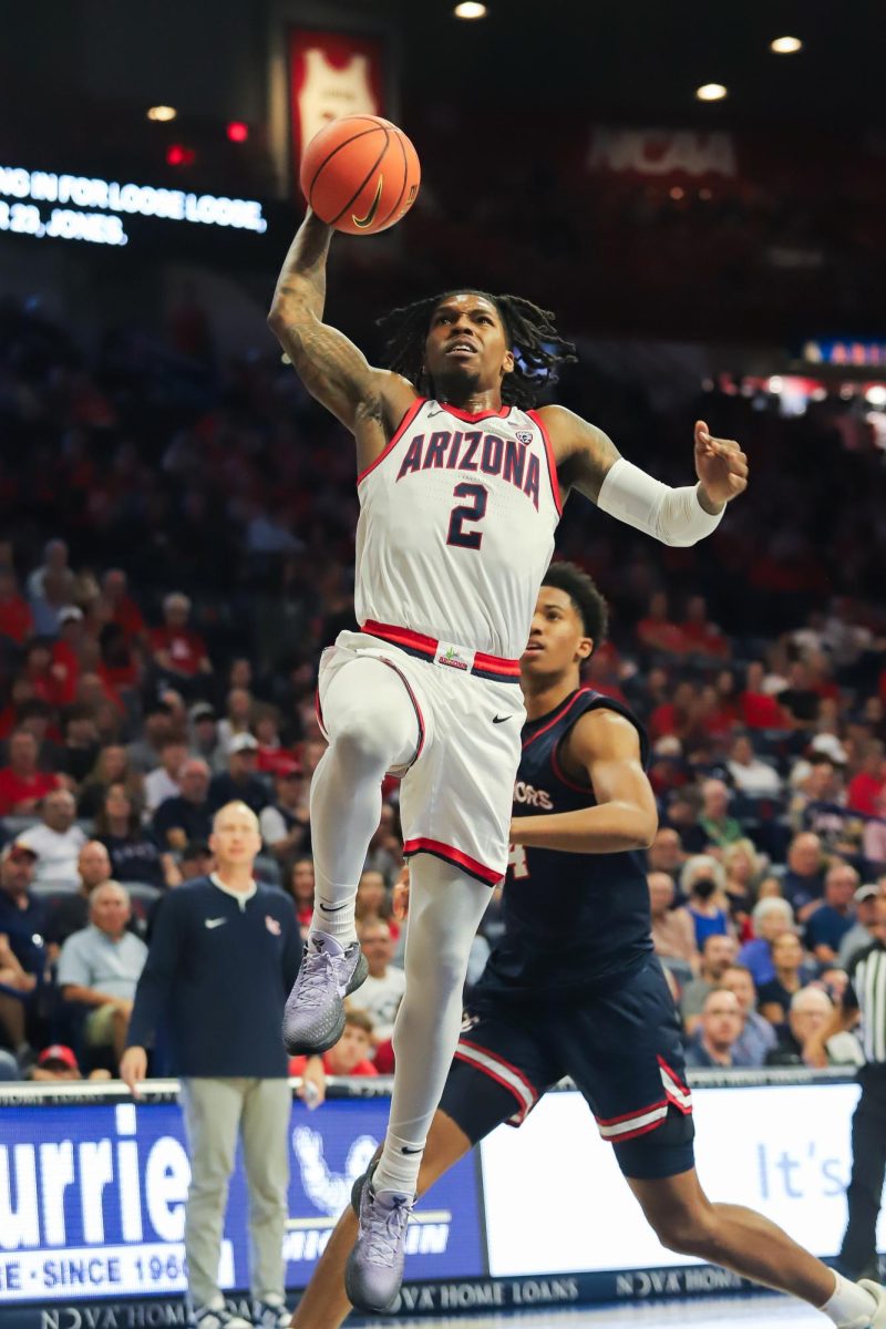 Arizona+mens+basketball+player+Caleb+Love+explodes+for+a+dunk+after+stealing+the+ball+from+Lewis-Clark+State+College+in+McKale+Center+on+Friday%2C+Oct.+20.+This+was+Love%E2%80%99s+first+game+with+Arizona+after+transferring+from+the+University+of+North+Carolina+during+the+offseason.%0A
