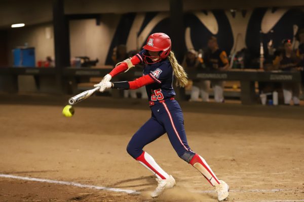 Freshman Regan Shockey slaps the ball fair for a base hit on Friday, Oct. 13, at Mike Candrea Field at Rita Hillenbrand Memorial Stadium. Arizona managed to end both games before the final inning due to mercy rule.