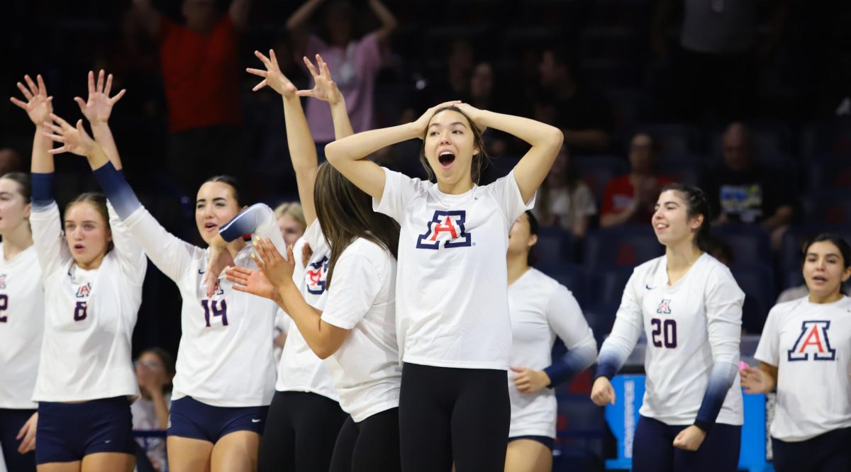 The Arizona bench reacts to an intense point against USC on Oct. 8 in McKale Center. Arizona extended the match but lost in five sets.