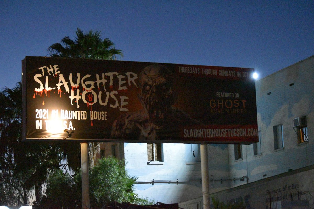 The billboard above Slaughterhouse as seen from W. Grant Road advertising the attraction. 