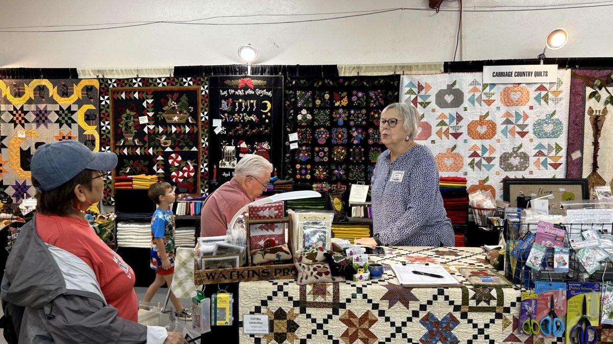 Debbie from Carriage Country Quilts Company attends the Quilt, Craft & Sewing Festival at the Tucson Expo Center on Nov. 10. The festival was held for three days from Nov. 9-11.
