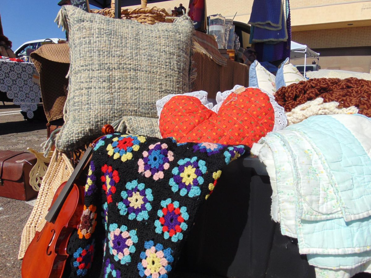 Thrifted crocheted blankets and handmade pillows were sold at the 2nd Sunday Market on Oracle Road on Nov. 12. The market was held in a Tucson Mall parking lot.
