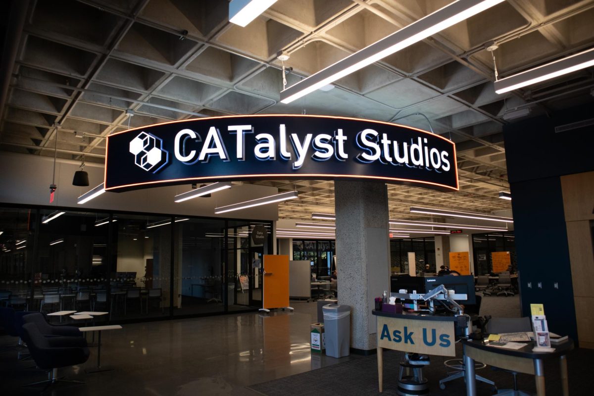 The sign for the CATalyst Studios in the UA Library welcomes students on Nov. 11. CATalyst Studios hosts study areas, maker spaces and even podcast studios.
