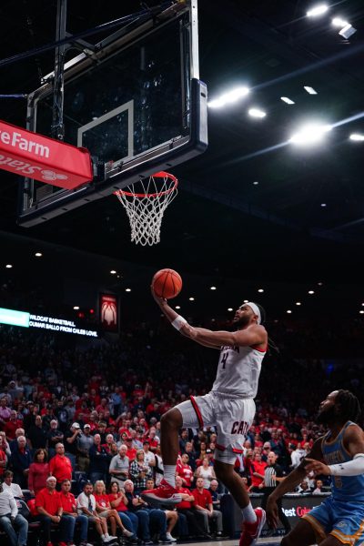 Kylan Boswell leaps to shoot a lay-up against Southern University in McKale Center on Monday, Nov. 13. Boswell was named Pac-12s Mens Basketball Player of the Week this week.
